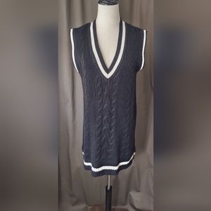 Long sleeveless sweater